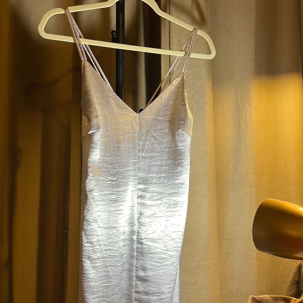 Never worn long silver satin party dress.